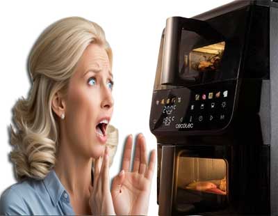 Deux fenêtres qui s'éclairent pour voir les aliments qui cuisent sans ouvrir les paniers...
